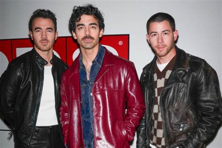 Jonas Brothers get their groove on in retro visual for ‘Only Human’